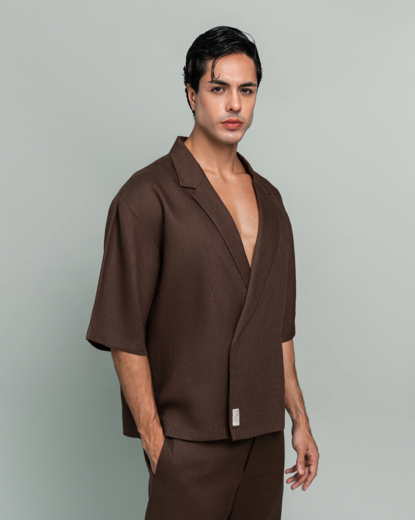 Close up of the notched lapel collar on 20Two Elemental SHADE OVER-SHIRT, worn open, Desert Dusk brown linen