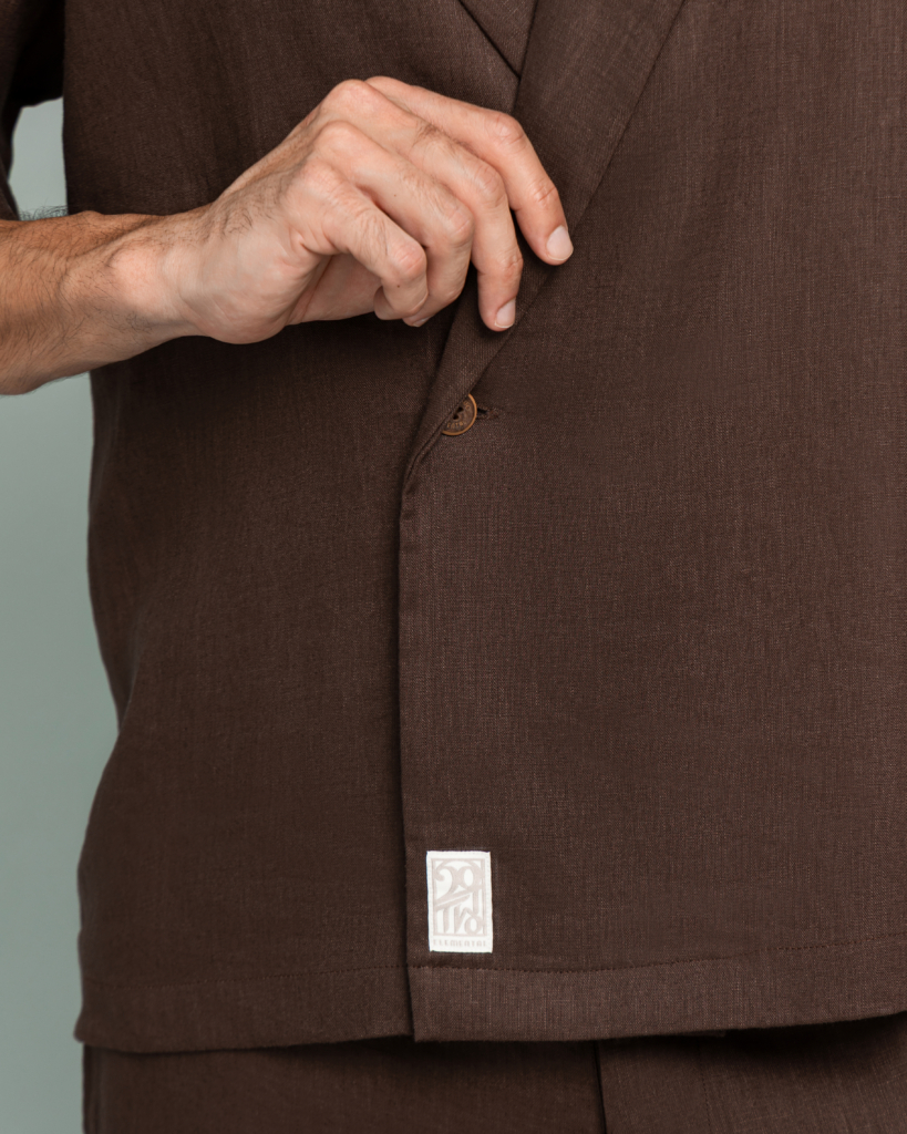 Close up of the Corozo tagua nut button on 20Two Elemental SHADE OVER-SHIRT, Desert Dusk brown linen