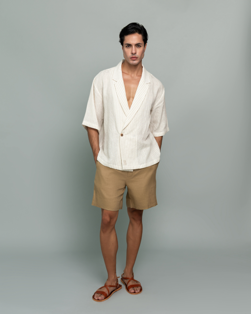 20Two Elemental SHADE OVER-SHIRT in Ivory Dune Stripe worn open over GRAIN TOP and DRIFT SHORT in Sand Dune, front standing view