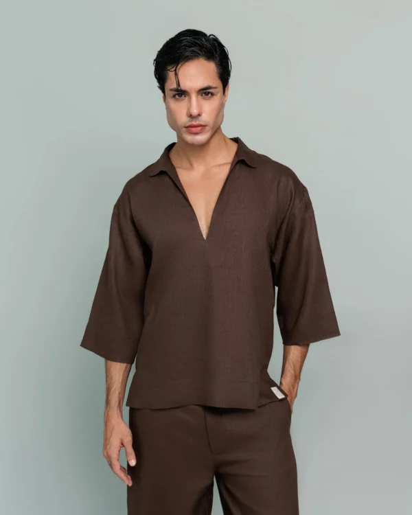 Close-up front detail of 20Two Elemental's GHAF grain-top in brown, relaxed v-neck