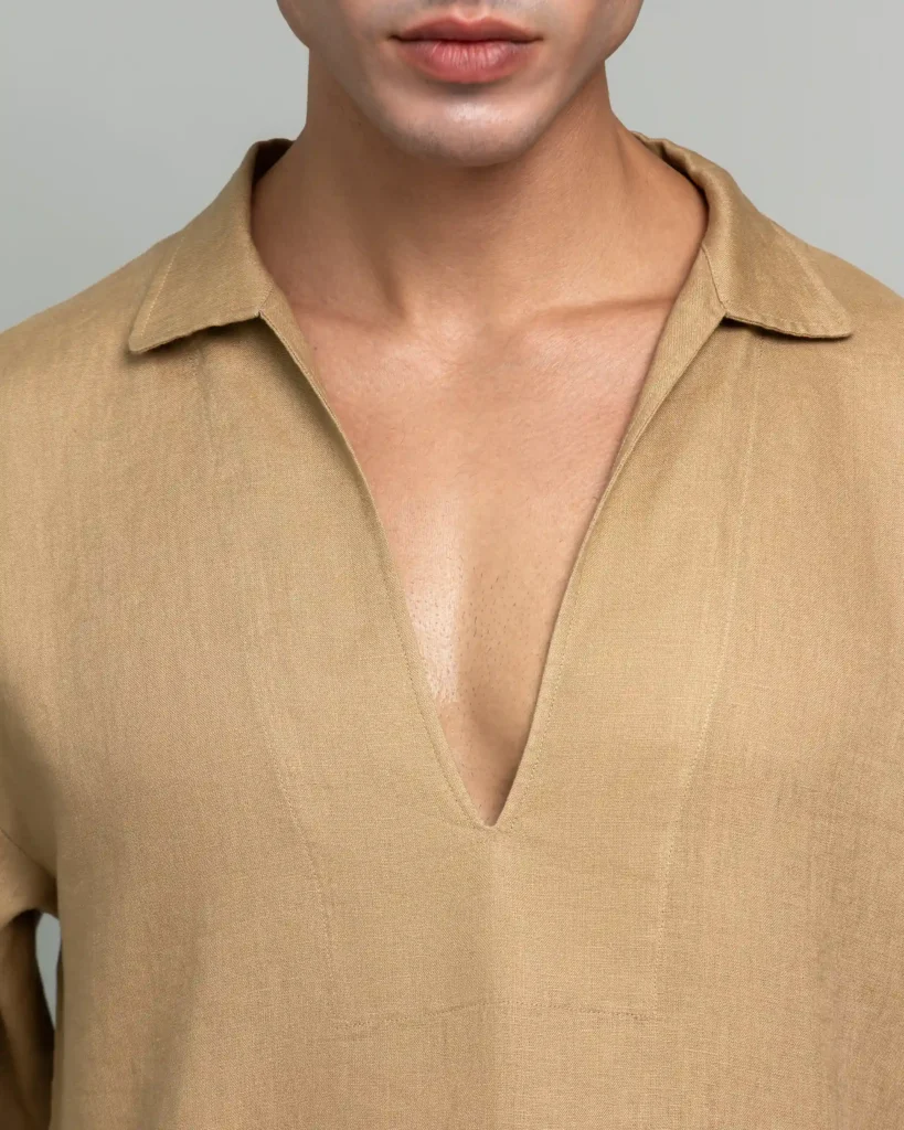 Close-up of the open v-neck collar on 20Two Elemental's GHAF grain-top in desert tan