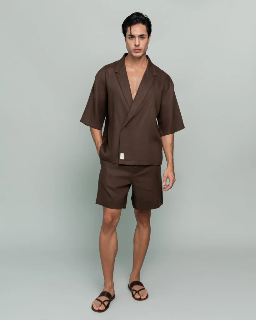 Man wearing 20Two Elemental's GHAF over-shirt and drift short set in brown, front view, calm studio atmosphere