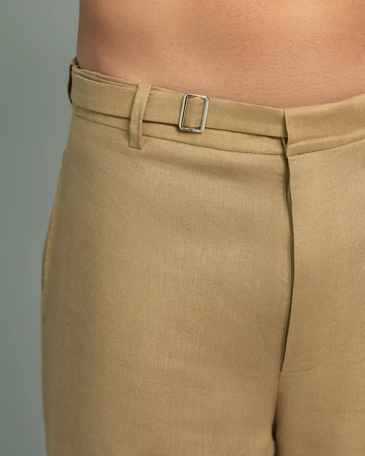 Close-up detail of the belted waist on 20Two Elemental's GHAF rooted trouser in desert tan
