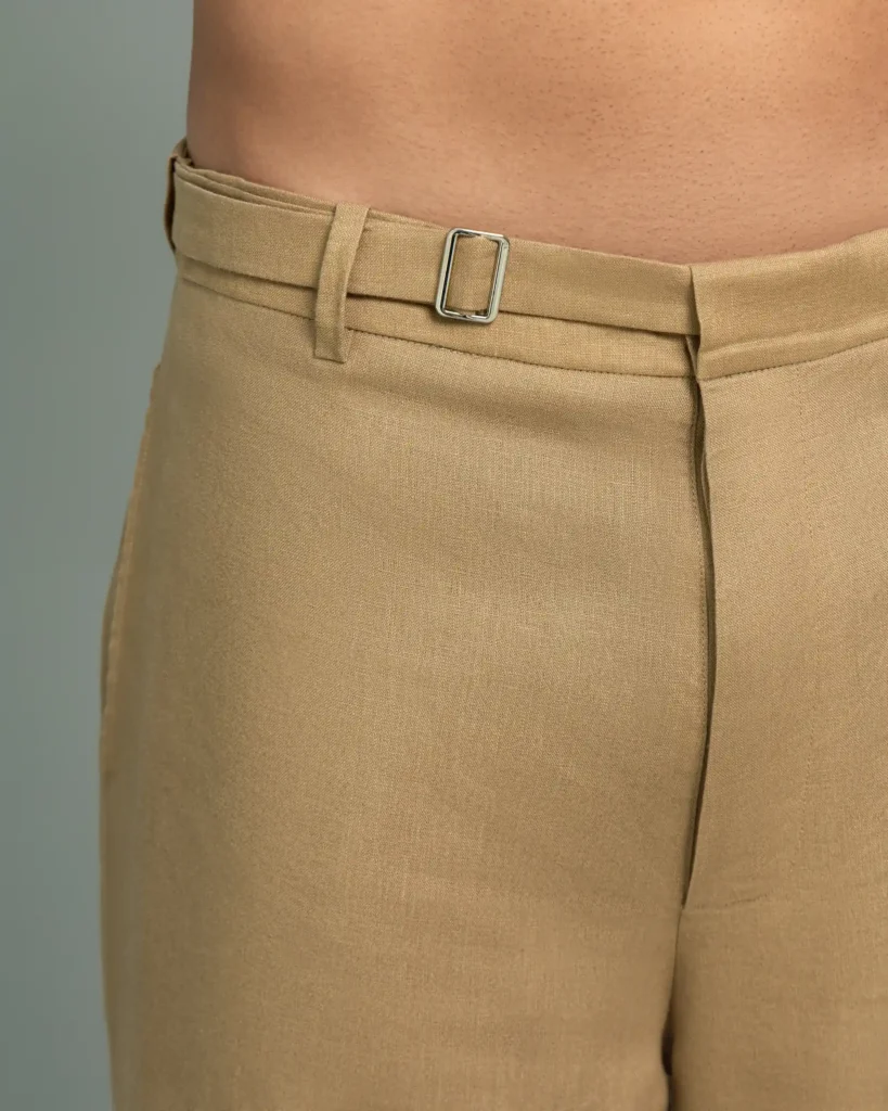 Close-up detail of the belted waist on 20Two Elemental's GHAF rooted trouser in desert tan